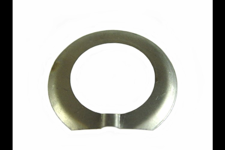 Lock plate for crankshaft pinion fixing nut