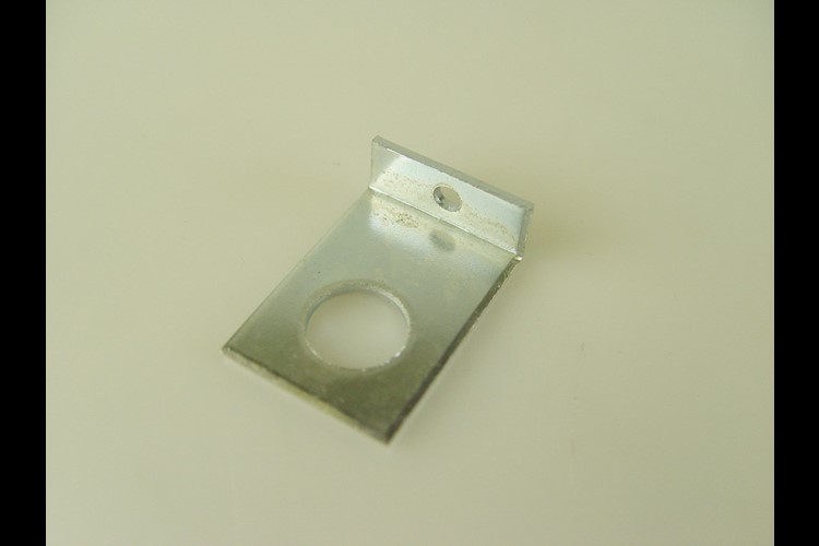 Anchor plate for clutch return spring